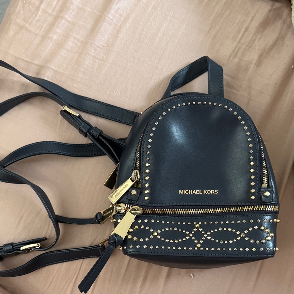 Michael Kors mini navy Backpack with Gold Studs